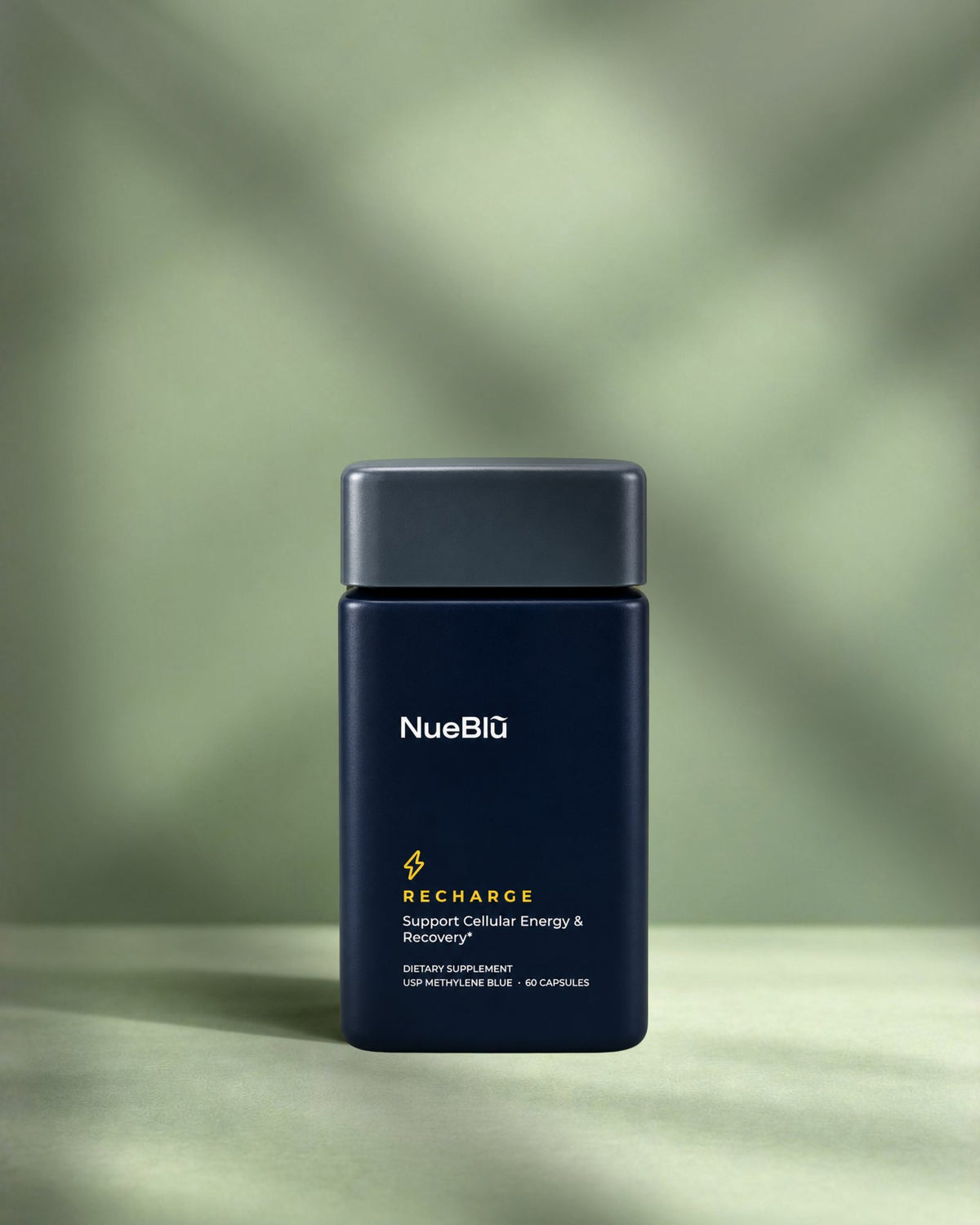 NueBlū Recharge jar on a soft green background