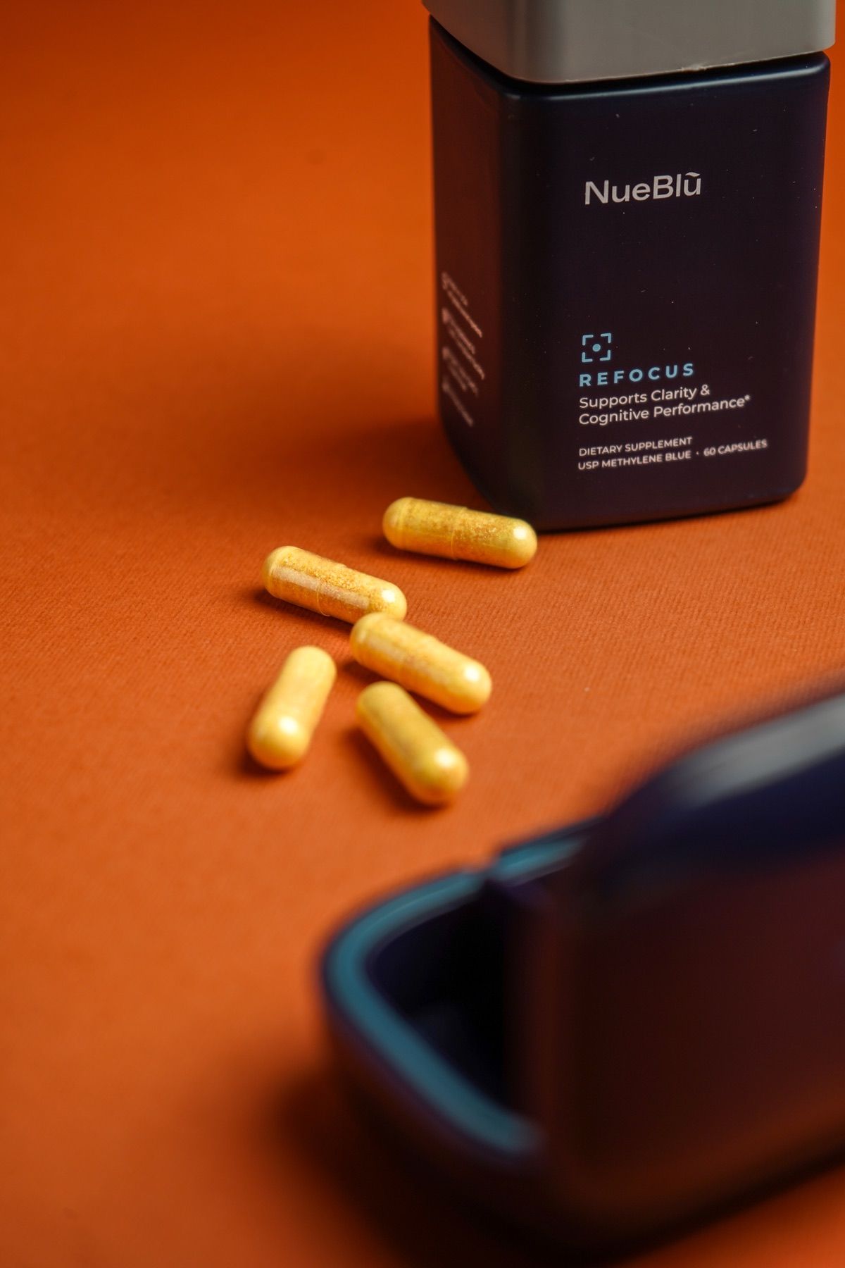 Refocus label and capsules, close up